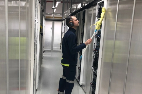 Comms room server rack cleaning