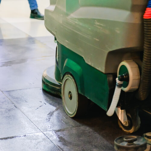 Scrub-washing tiled floor