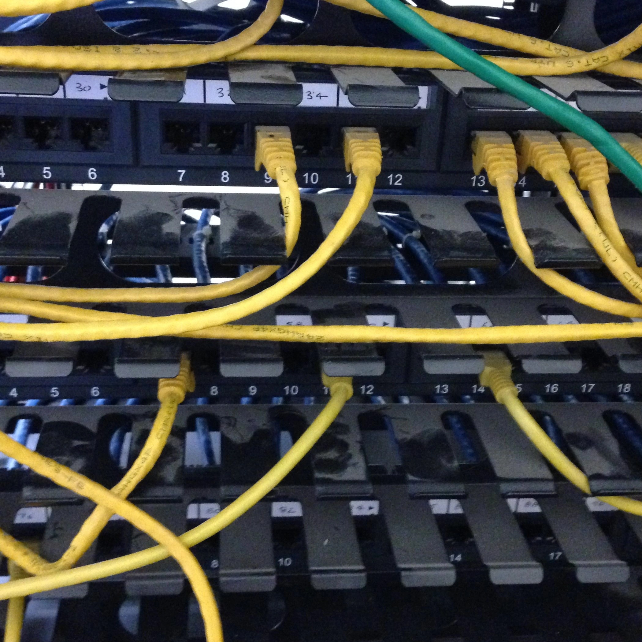Dusty cable divider before server rack cleaning